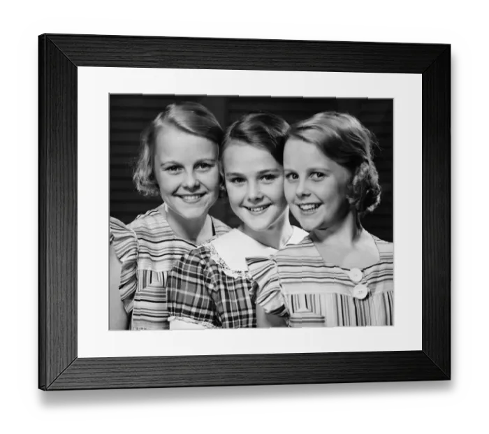 Framed Print : Three smiling girls (12-13) in row, (B&W), portrait Framed Print : Three smiling girls (12-13) in row, (B&W), portrait