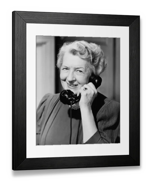 Framed Print : Senior woman talking on telephone, (B&W) Framed Print : Senior woman talking on telephone, (B&W)