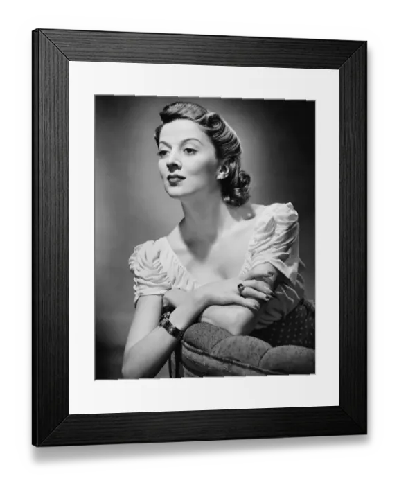 Framed Print : Young woman posing in studio, (B&W), portrait Framed Print : Young woman posing in studio, (B&W), portrait