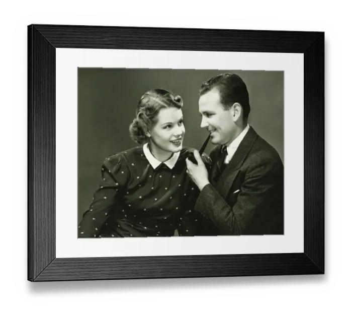 Framed Print : Portrait of young couple, man holding pipe, smiling, (Portrait) Framed Print : Portrait of young couple, man holding pipe, smiling, (Portrait)
