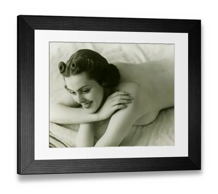 Framed Print : Nude woman lying face down on bed, (B&W) Framed Print : Nude woman lying face down on bed, (B&W)
