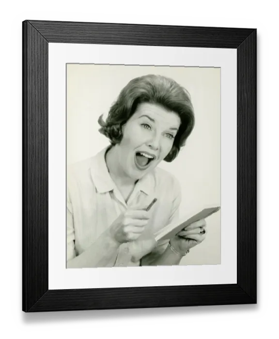 Framed Print : Woman in striped blouse with surprised facial expression, posing in studio, (B&W), (Portrait) Framed Print : Woman in striped blouse with surprised facial expression, posing in studio, (B&W), (Portrait)