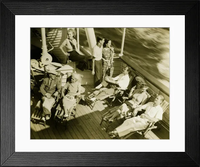 Framed Print : Group of people relaxing on deck of cruise ship, (B&W), (High angle view) Framed Print : Group of people relaxing on deck of cruise ship, (B&W), (High angle view)