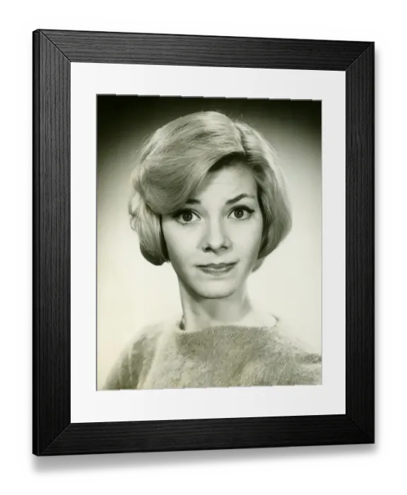 Framed Print : Young woman with pursed lips posing in studio, (B&W), (Portrait) Framed Print : Young woman with pursed lips posing in studio, (B&W), (Portrait)