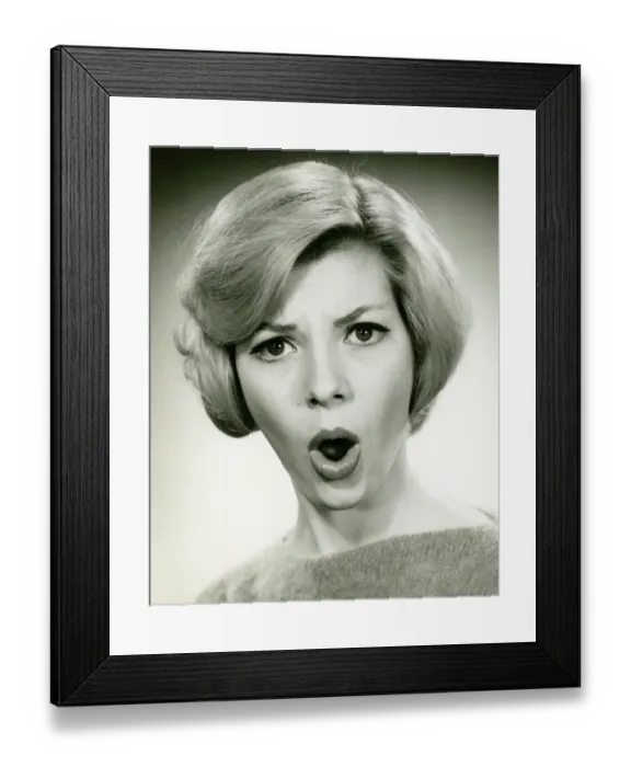 Framed Print : Young woman with open mouth in studio, (B&W), (Portrait) Framed Print : Young woman with open mouth in studio, (B&W), (Portrait)