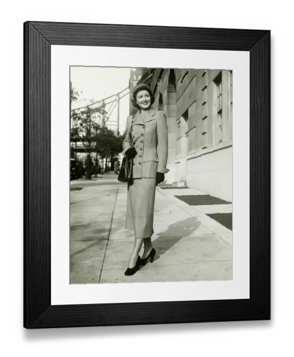 Framed Print : Elegant woman posing on sidewalk, (B&W), portrait Framed Print : Elegant woman posing on sidewalk, (B&W), portrait
