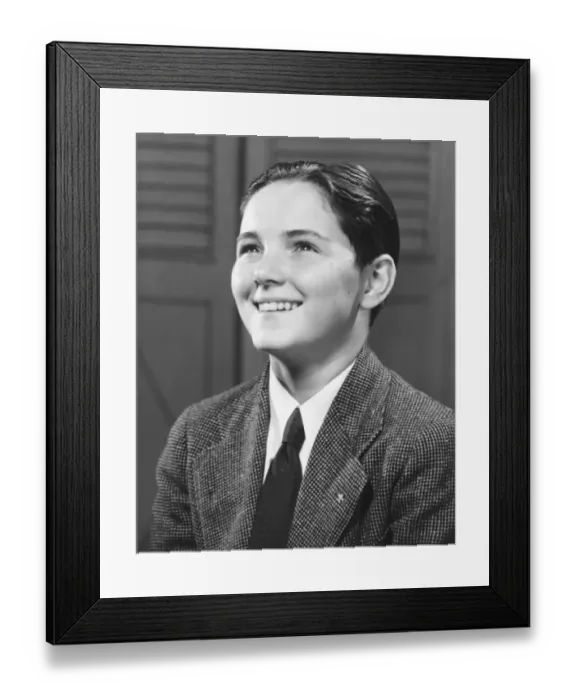 Framed Print : Smiling boy (12-13) posing, (B&W), close-up, portrait Framed Print : Smiling boy (12-13) posing, (B&W), close-up, portrait