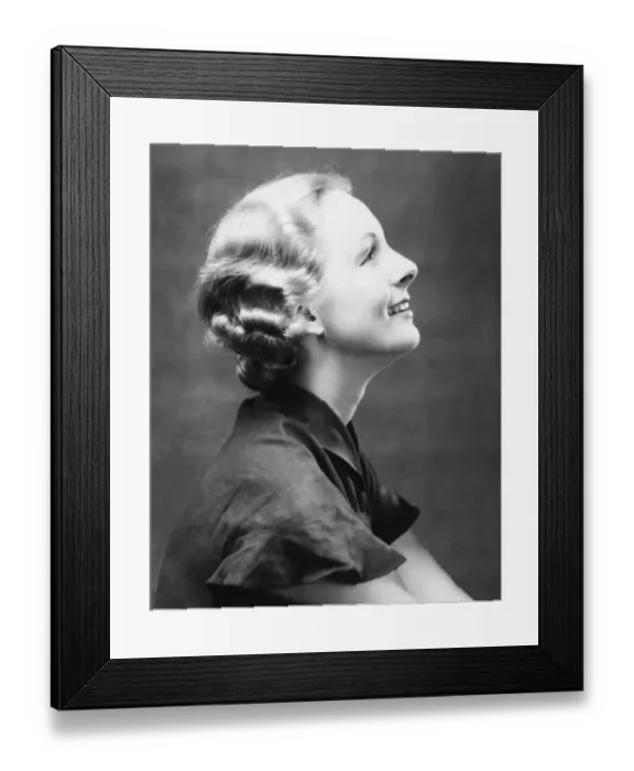 Framed Print : Profile of smiling woman, (B&W), close-up, portrait Framed Print : Profile of smiling woman, (B&W), close-up, portrait