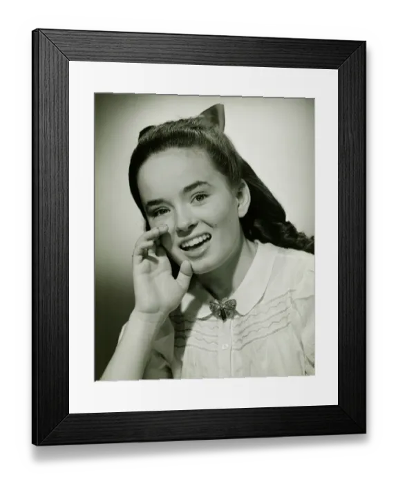 Framed Print : Teenage girl (14-15) with cupped hand, calling, (B&W), portrait Framed Print : Teenage girl (14-15) with cupped hand, calling, (B&W), portrait