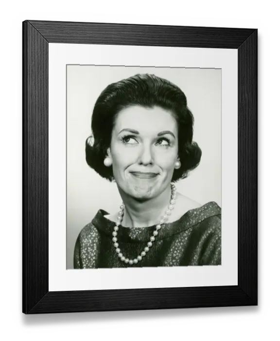 Framed Print : Woman wearing pearls looking away, posing in studio, (B&W), (Portrait)