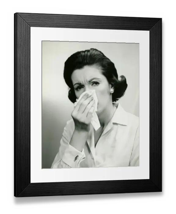 Framed Print : Woman wiping nose with handkerchief, (B&W), (Portrait) Framed Print : Woman wiping nose with handkerchief, (B&W), (Portrait)