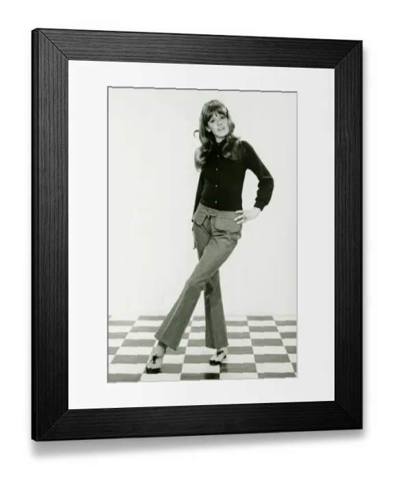 Framed Print : Young woman standing on checked floor, (B&W) Framed Print : Young woman standing on checked floor, (B&W)