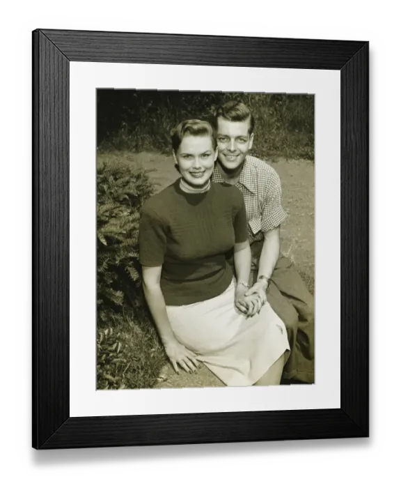 Framed Print : Couple sitting on wall in park, (B&W), (Portrait) Framed Print : Couple sitting on wall in park, (B&W), (Portrait)