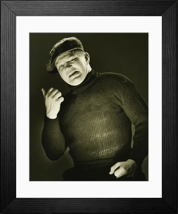 Framed Print : Man showing direction with thumb, posing, (B&W), (Portrait) Framed Print : Man showing direction with thumb, posing, (B&W), (Portrait)