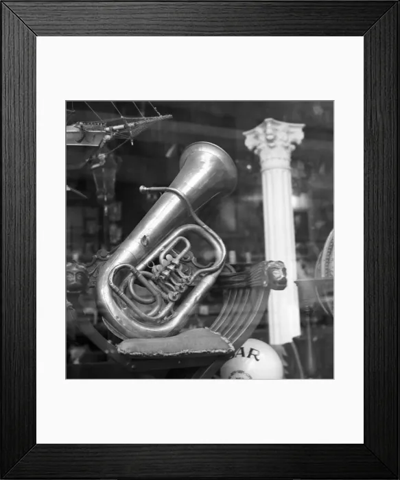 Framed Print : Euphonium on window display