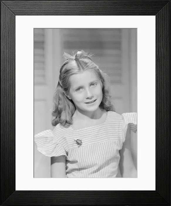 Framed Print : Portrait of girl (10-11) smiling Framed Print : Portrait of girl (10-11) smiling