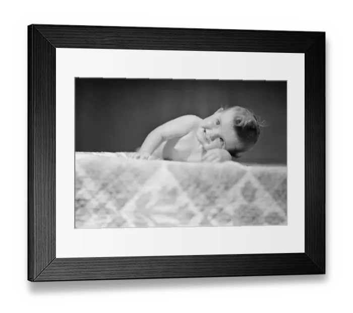 Framed Print : Baby boy (2-5 months) crawling on bed Framed Print : Baby boy (2-5 months) crawling on bed