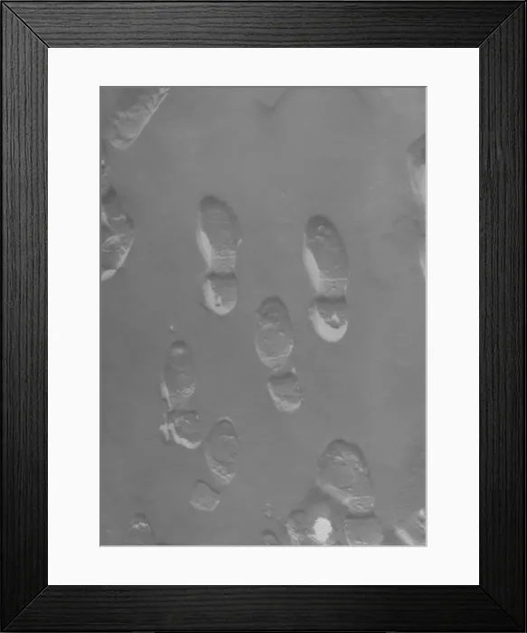 Framed Print : Footprints on snow, view from above Framed Print : Footprints on snow, view from above