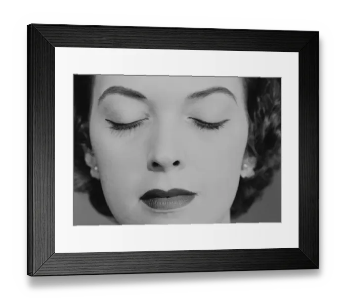 Framed Print : Mature woman with eyes closed, close-up Framed Print : Mature woman with eyes closed, close-up