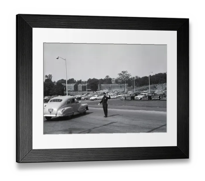 Framed Print : Policeman controlling traffic, parking place behind him Framed Print : Policeman controlling traffic, parking place behind him