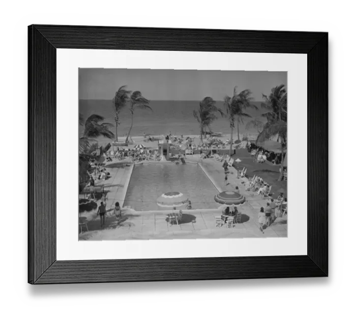 Framed Print : People at holiday resort by sea, elevated view