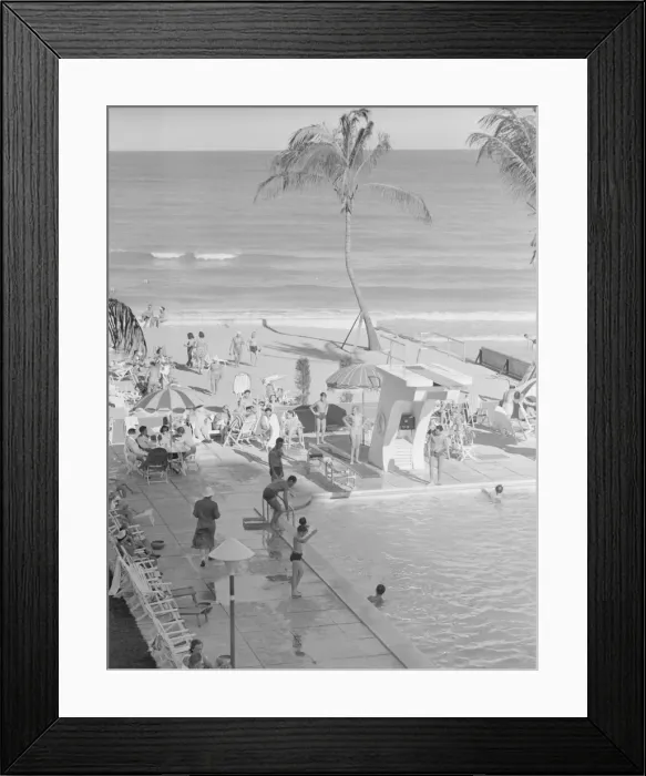 Framed Print : People at holiday resort by sea, elevated view Framed Print : People at holiday resort by sea, elevated view