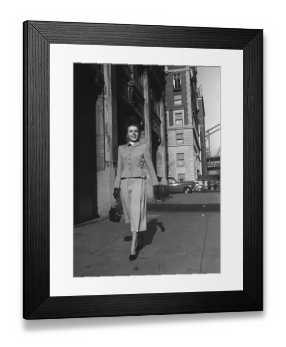 Framed Print : Woman walking on sidewalk, (B&W) Framed Print : Woman walking on sidewalk, (B&W)
