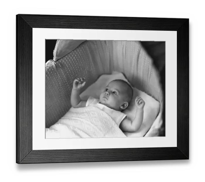 Framed Print : Baby (3-6 months) lying in crib, (B&W), elevated view Framed Print : Baby (3-6 months) lying in crib, (B&W), elevated view
