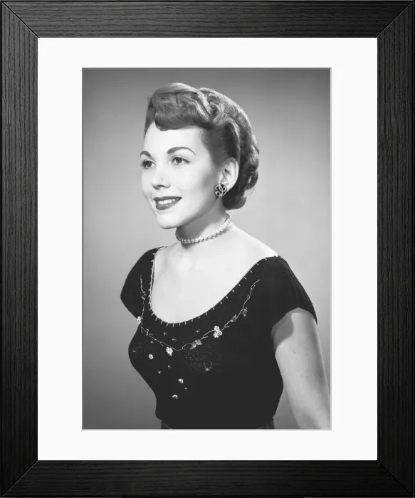 Framed Print : Young woman posing in studio, (B&W), portrait Framed Print : Young woman posing in studio, (B&W), portrait