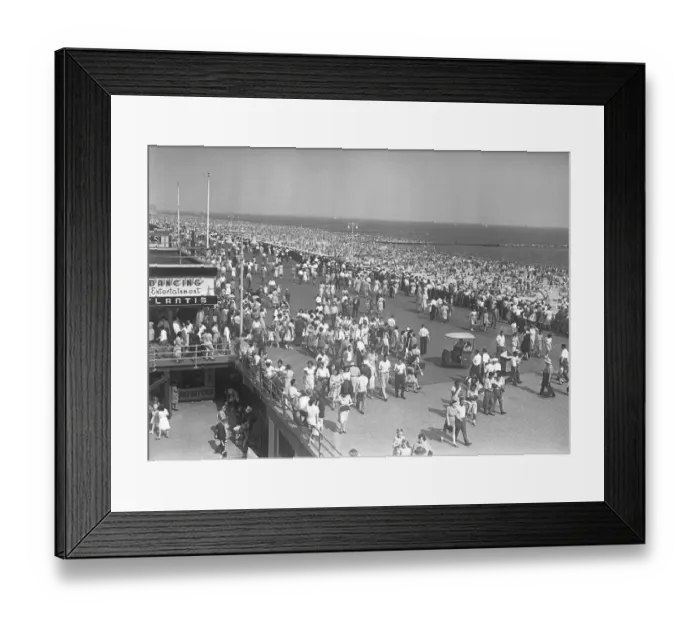 Framed Print : Crowd of people walking along beach, (B&W), elevated view
