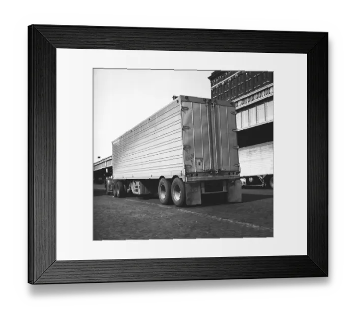 Framed Print : Lorry in parking lot, (rear view), (B&W)