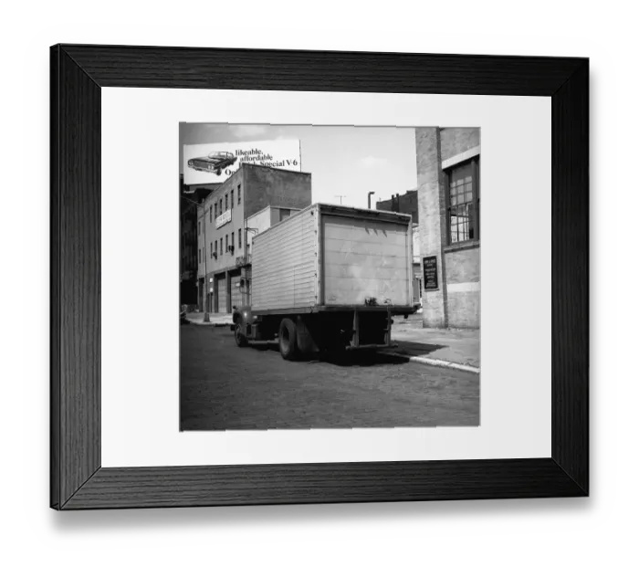 Framed Print : Truck parked at sidewalk, (rear view), (B&W)