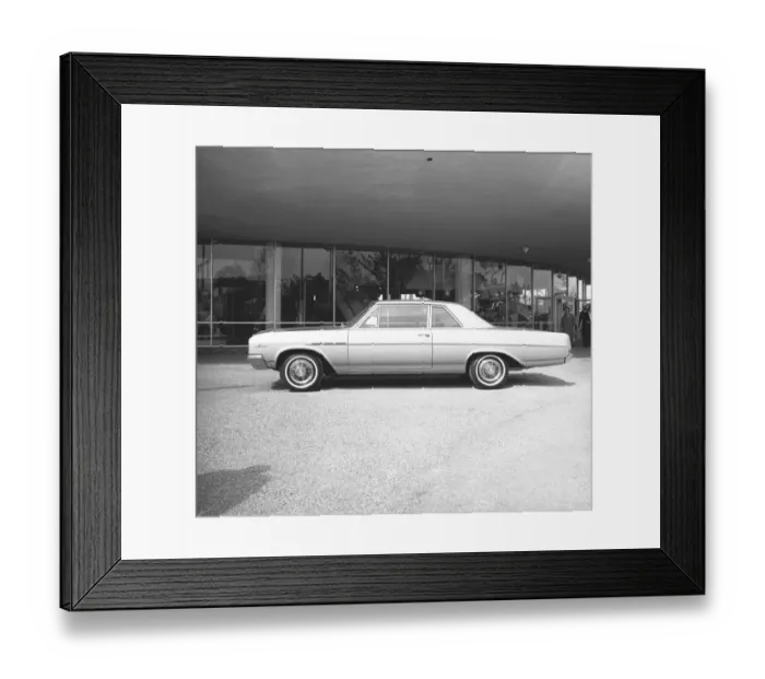 Framed Print : Sedan car in parking lot, (B&W) Framed Print : Sedan car in parking lot, (B&W)