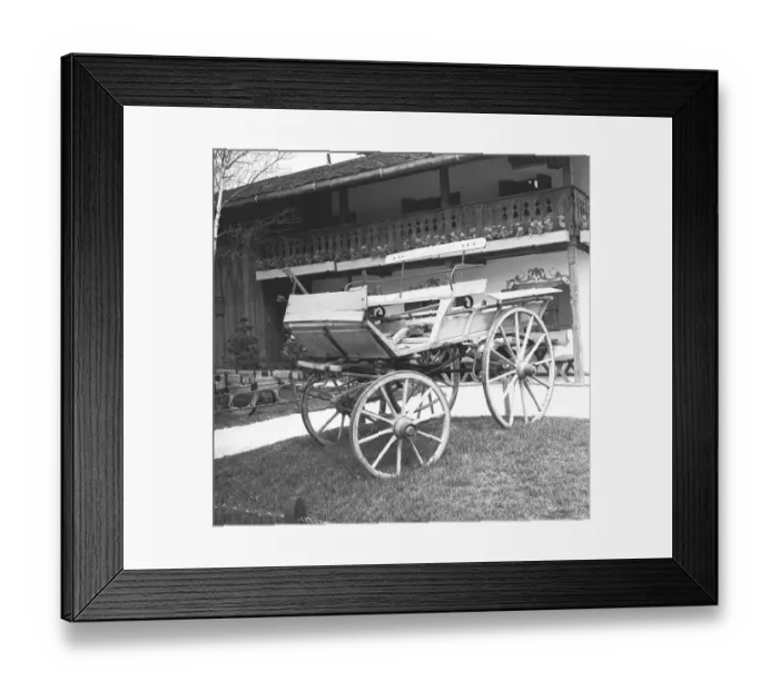 Framed Print : Old fashion carriage in front of house, (B&W) Framed Print : Old fashion carriage in front of house, (B&W)