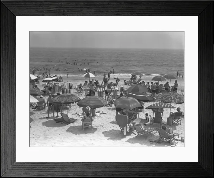 Framed Print : People relaxing on beach, (B&W), elevated view Framed Print : People relaxing on beach, (B&W), elevated view
