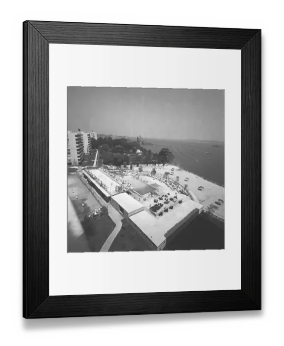 Framed Print : Resort swimming pools and beach, (B&W), elevated view Framed Print : Resort swimming pools and beach, (B&W), elevated view