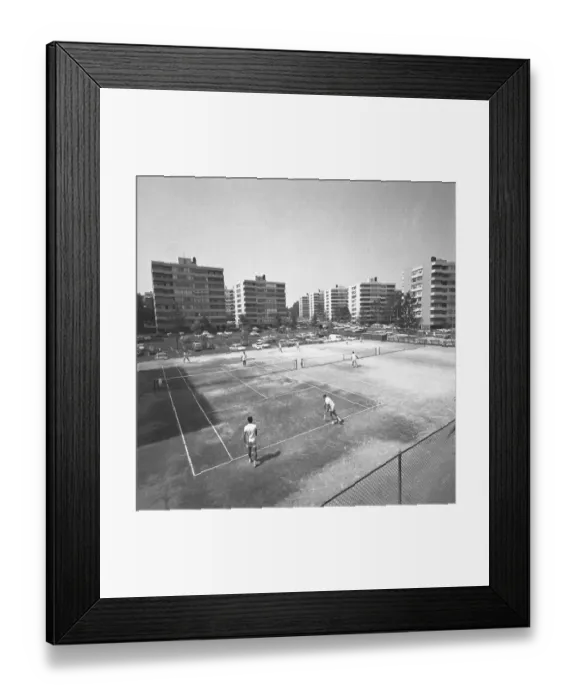Framed Print : People playing tennis on court, (B&W), elevated view Framed Print : People playing tennis on court, (B&W), elevated view