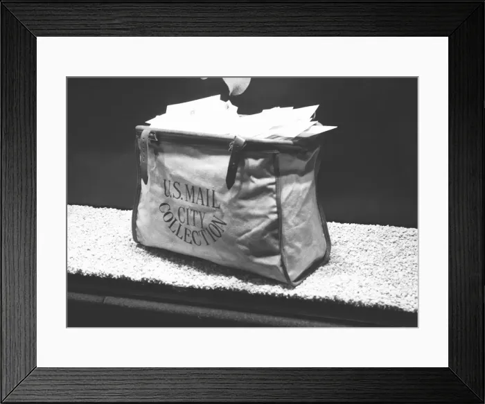 Framed Print : Mailmans bag full of letters, (B&W) Framed Print : Mailmans bag full of letters, (B&W)