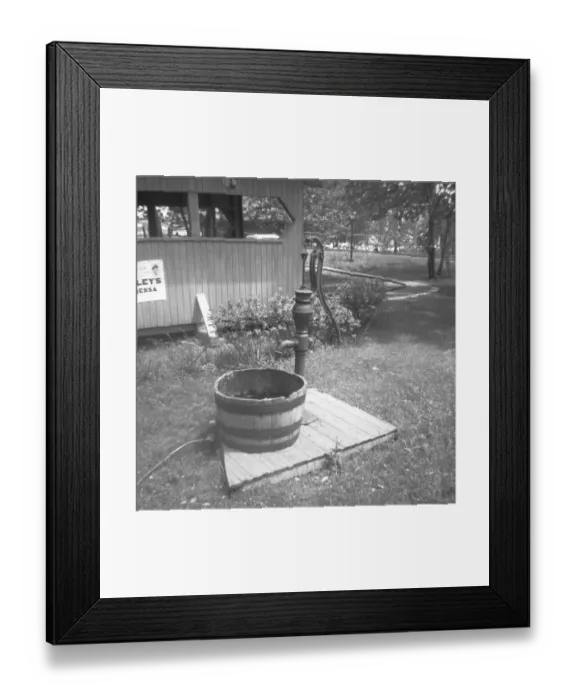 Framed Print : Barrel at water pump in garden, (B&W) Framed Print : Barrel at water pump in garden, (B&W)