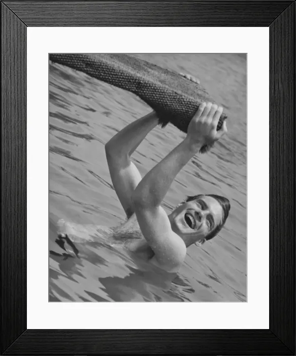 Framed Print : Man hanging from diving board (B&W) Framed Print : Man hanging from diving board (B&W)