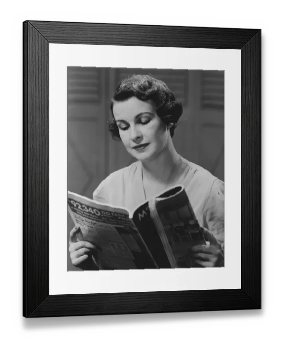 Framed Print : Woman reading magazine (B&W) Framed Print : Woman reading magazine (B&W)