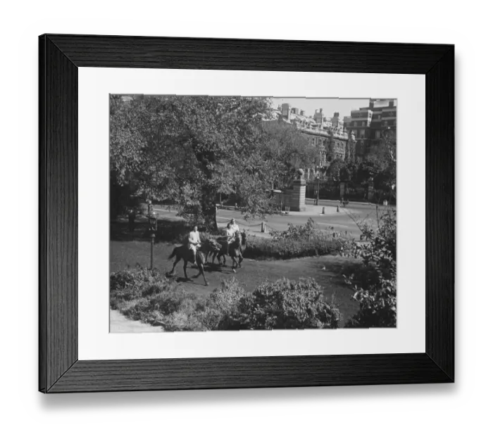 Framed Print : People riding horses in park (B&W), elevated view Framed Print : People riding horses in park (B&W), elevated view