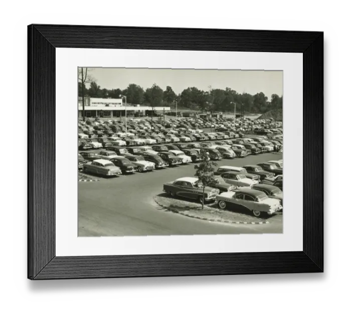 Framed Print : Cars parked on lot at shopping centre, elevated view (B&W) Framed Print : Cars parked on lot at shopping centre, elevated view (B&W)