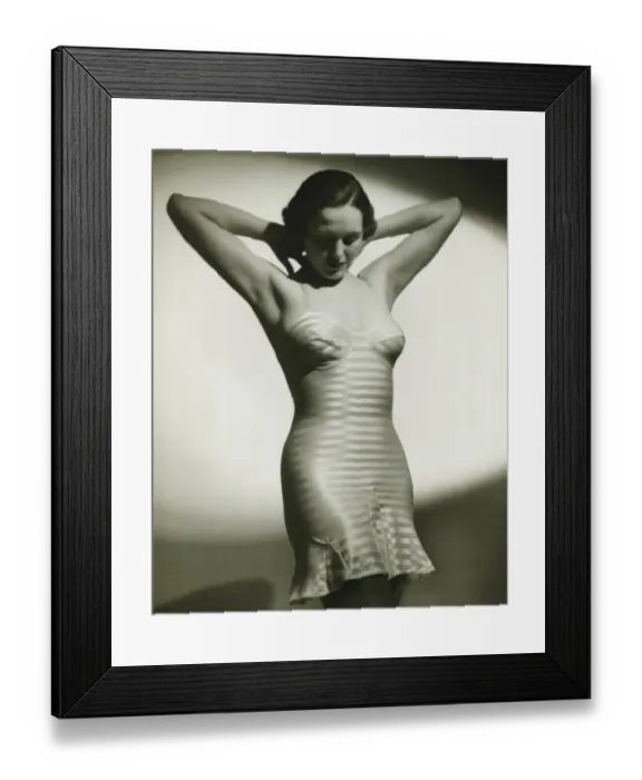 Framed Print : Woman in underskirt posing in studio, (B&W), portrait Framed Print : Woman in underskirt posing in studio, (B&W), portrait