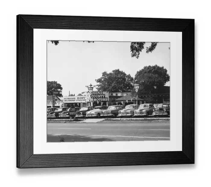 Framed Print : Car parked in used car lot, (B&W), low section Framed Print : Car parked in used car lot, (B&W), low section