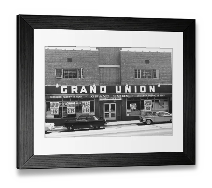 Framed Print : Cars parked on town street, in front of shop, (B&W) Framed Print : Cars parked on town street, in front of shop, (B&W)