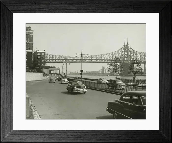 Framed Print : City road alongside river, (B&W) Framed Print : City road alongside river, (B&W)