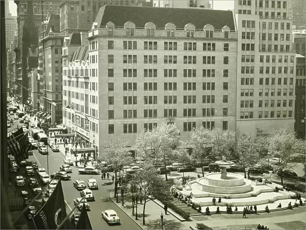 Busy street at Plaza Hotel, New York City, (B&W), (Elevated view)