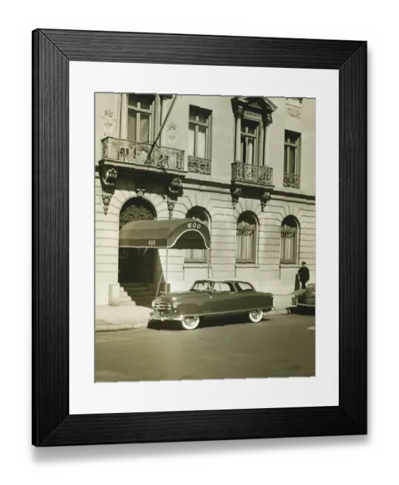 Framed Print : Car standing in front of hotel entrance, (B&W) Framed Print : Car standing in front of hotel entrance, (B&W)