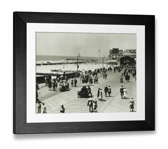 Framed Print : People walking on promenade by seashore, (B&W), (Elevated view) Framed Print : People walking on promenade by seashore, (B&W), (Elevated view)